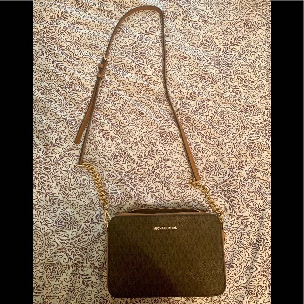 Michael Kors crossbody clutch purse.